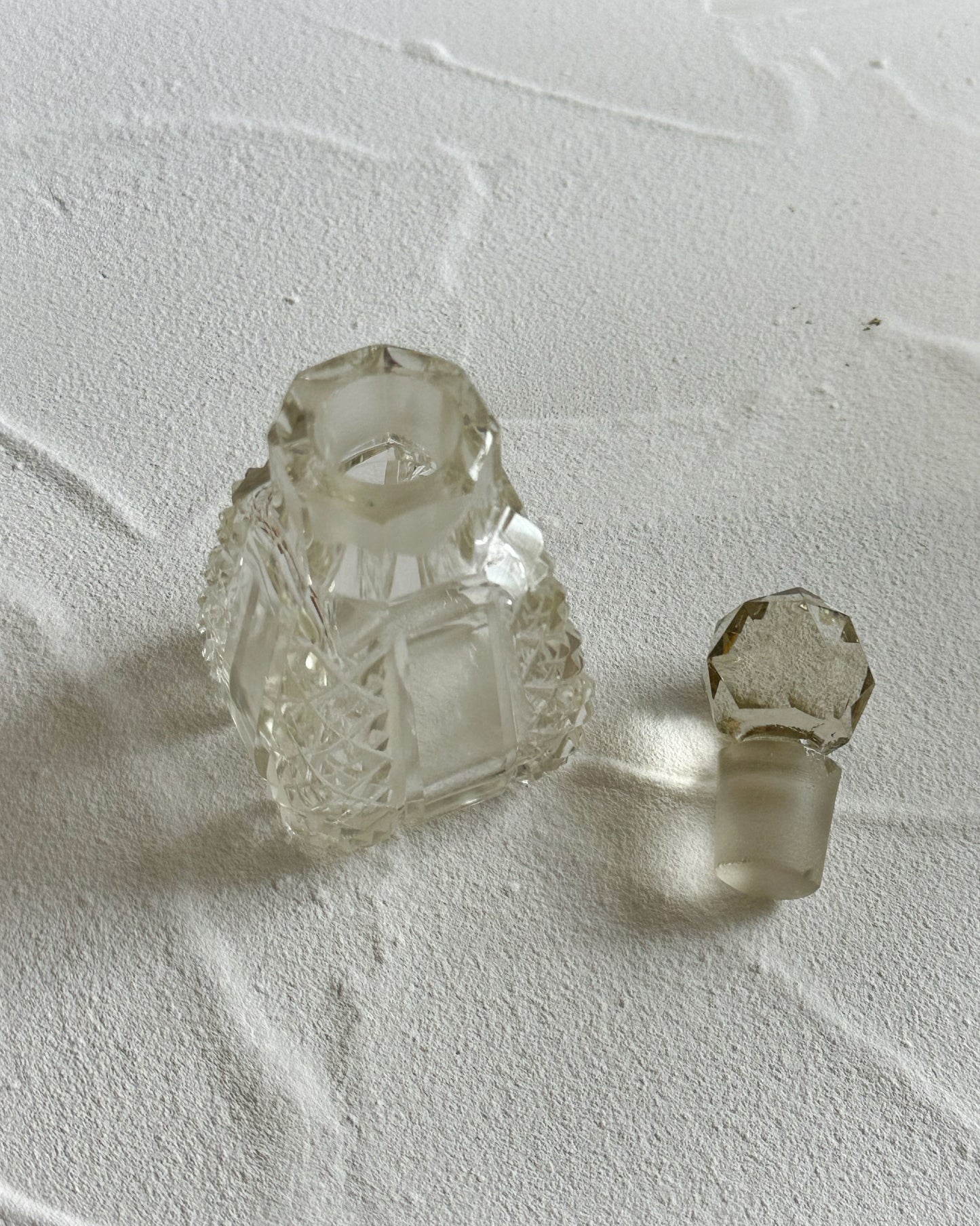 Small antique Edwardian cut glass perfume bottle