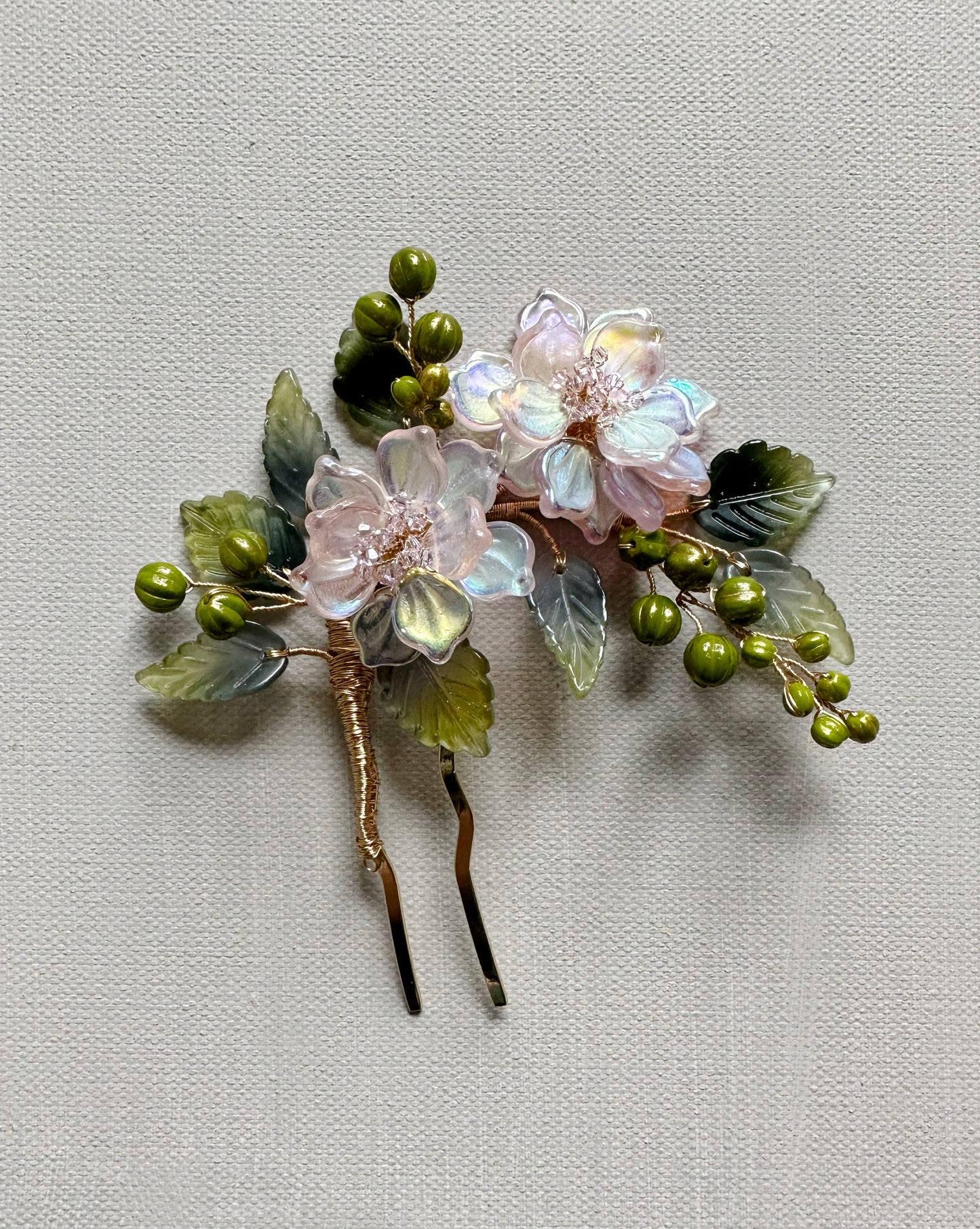 The new peony luxurious wedding hairpiece in aurora borealis pink