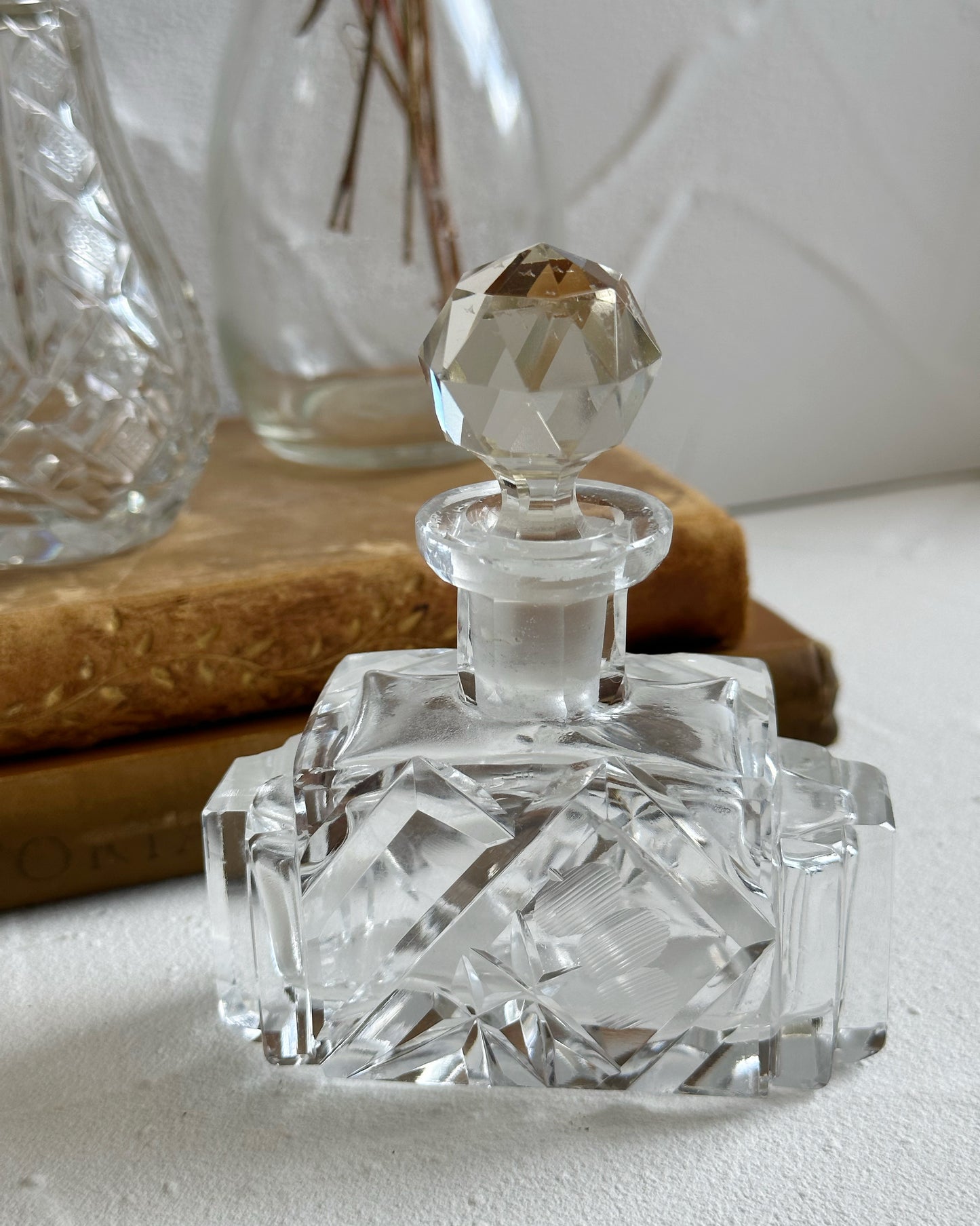 Antique Art Deco stylised flower cut glass perfume bottle