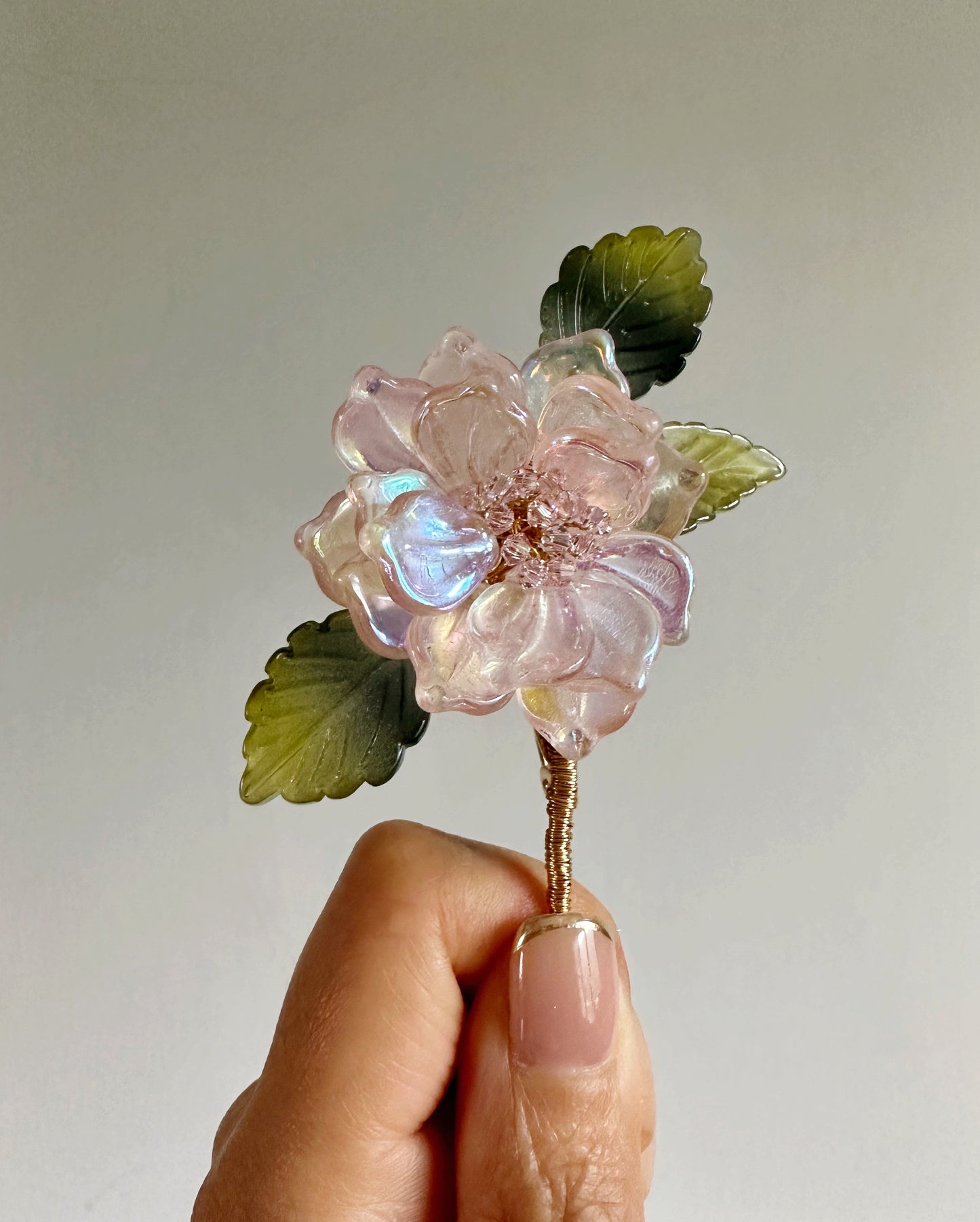 The new peony lapel brooch in AB pink