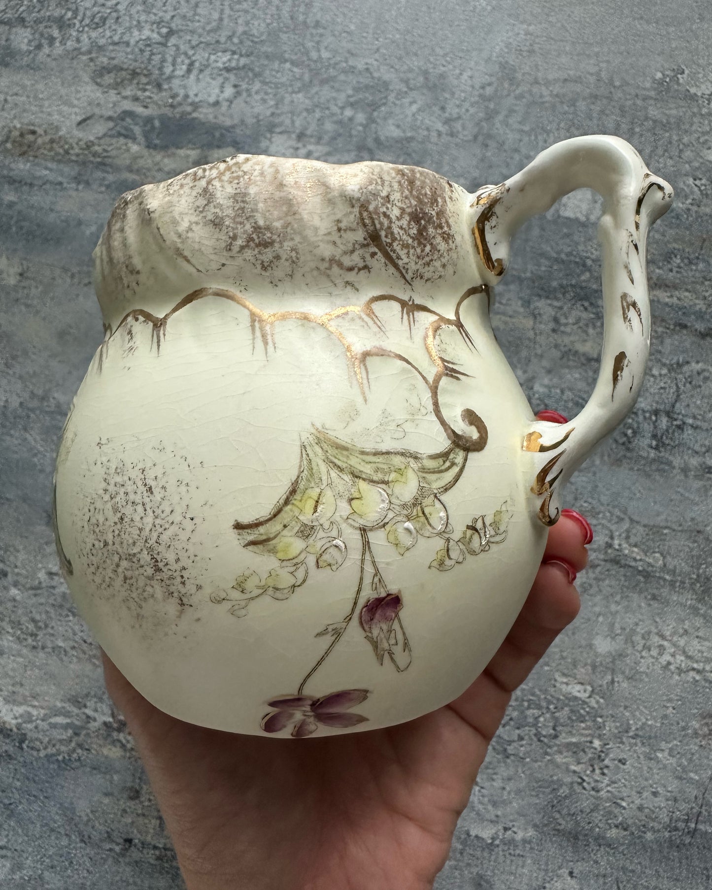 Antique handpainted lily of the valley water jug and milk jug set