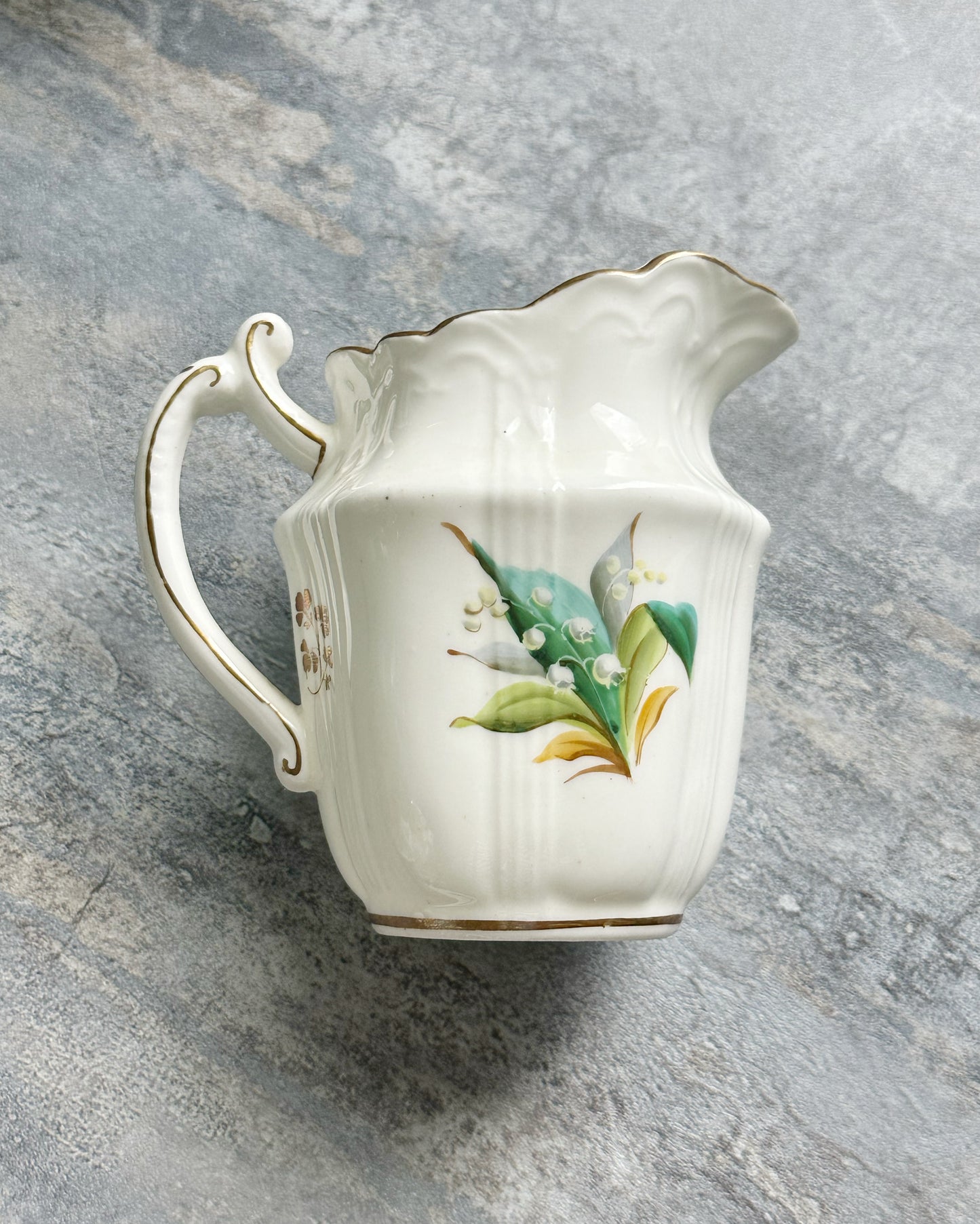 Antique English hand painted lily of the valley sugar bowl and milk jug set