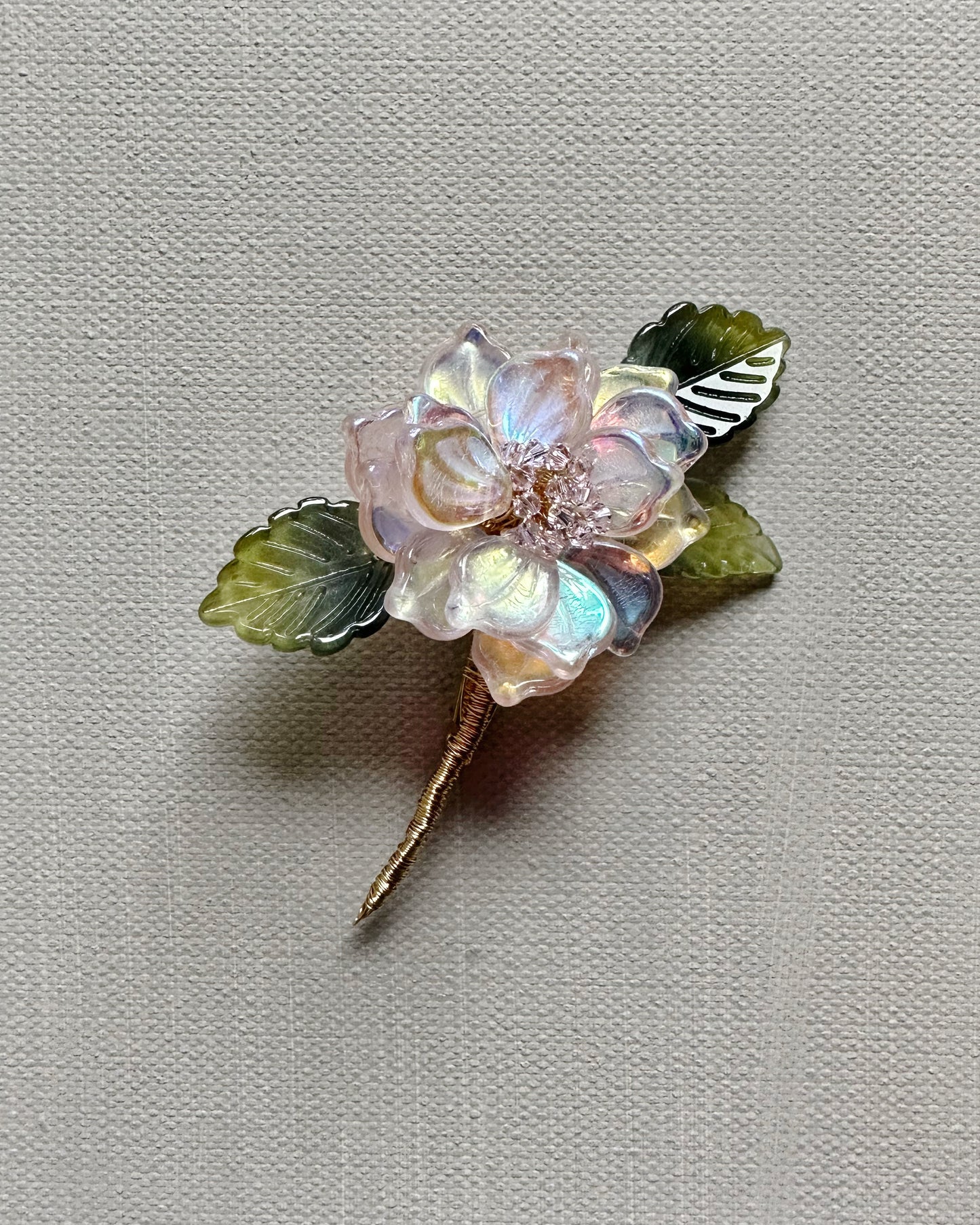 The new peony lapel brooch in AB pink