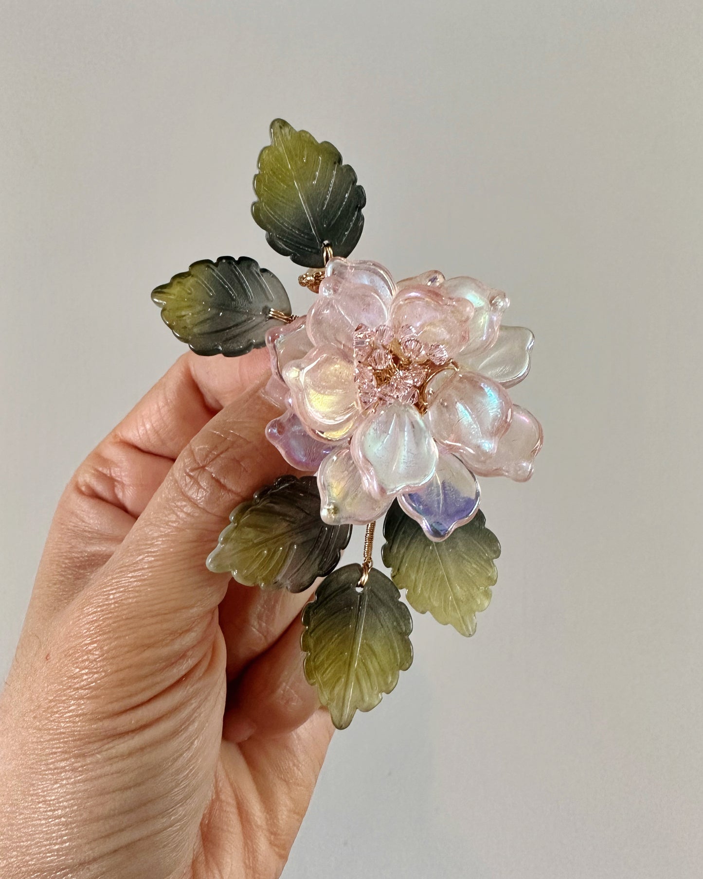 The new peony collar brooch in AB pink