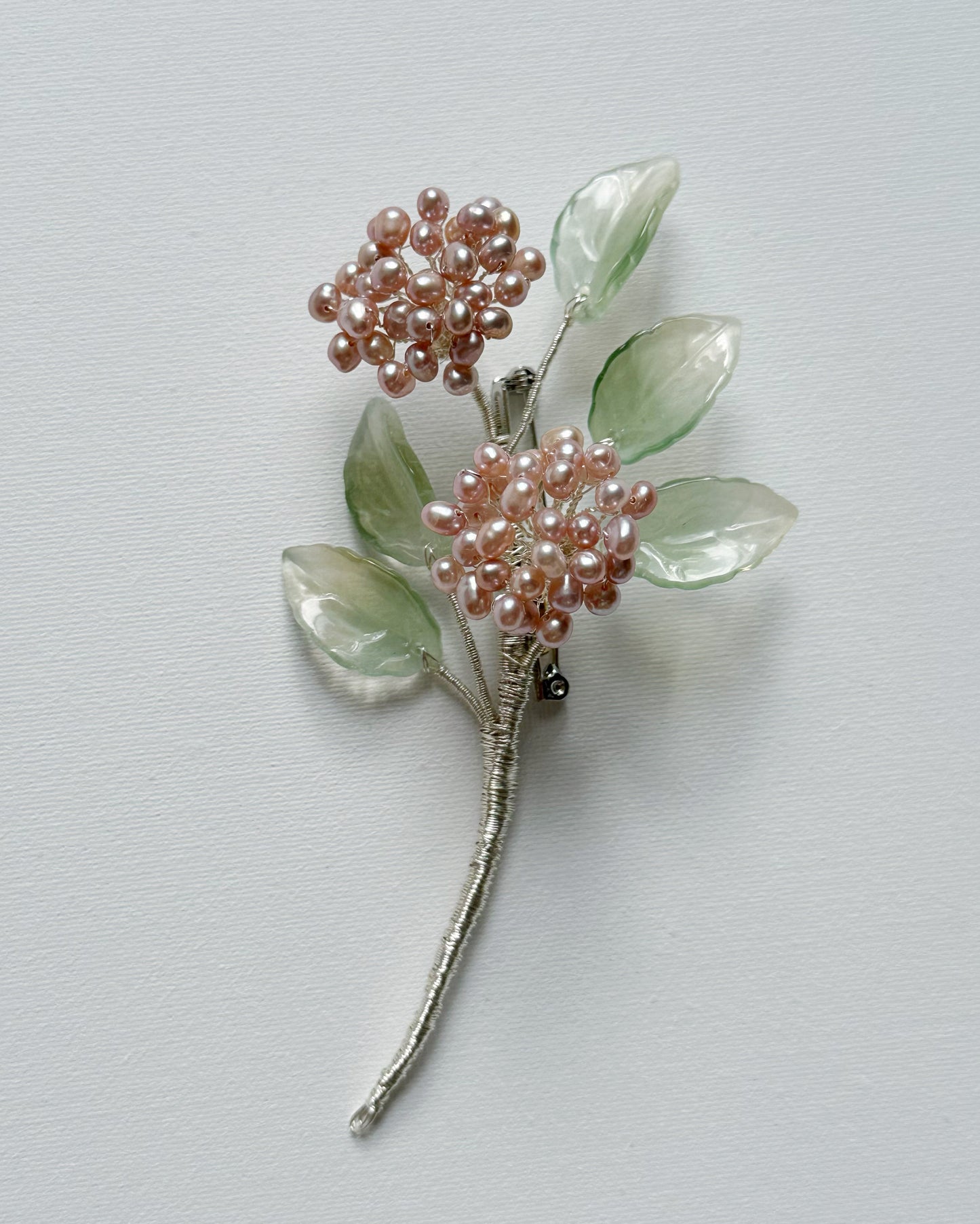 Floral fairy hydrangea bouquet brooch in pink pearls