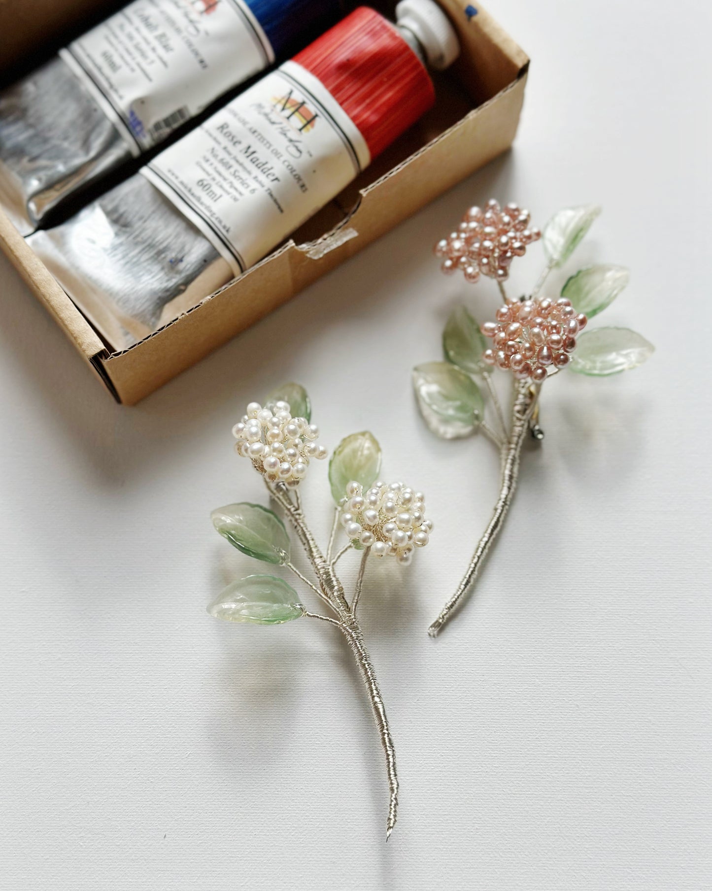 Floral fairy hydrangea bouquet brooch in pink pearls