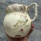 Antique handpainted lily of the valley water jug and milk jug set