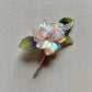 The new peony lapel brooch in AB pink