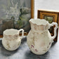 Antique handpainted lily of the valley water jug and milk jug set