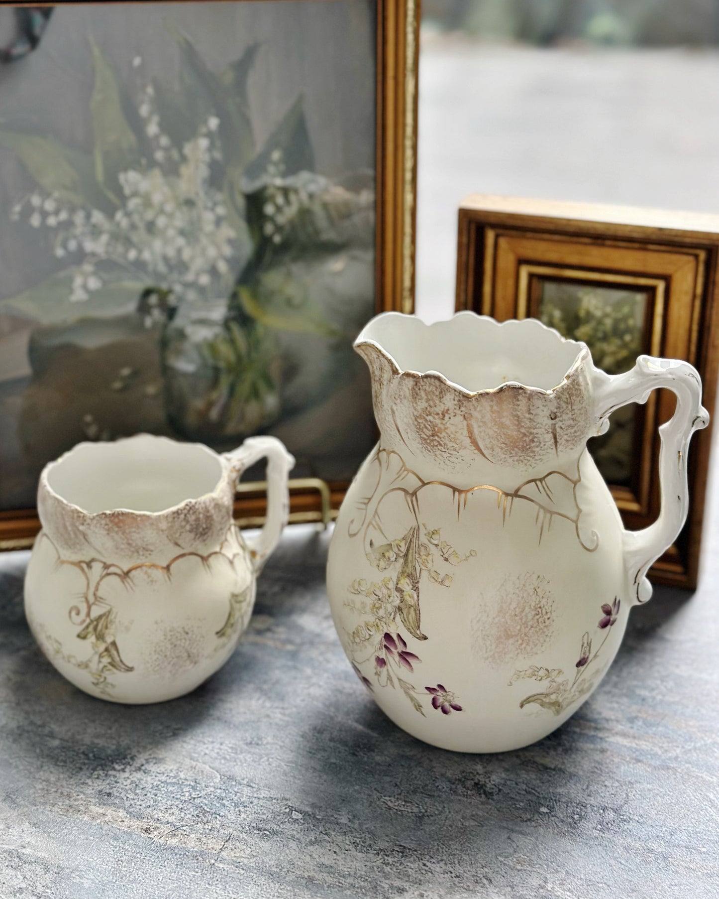 Antique handpainted lily of the valley water jug and milk jug set