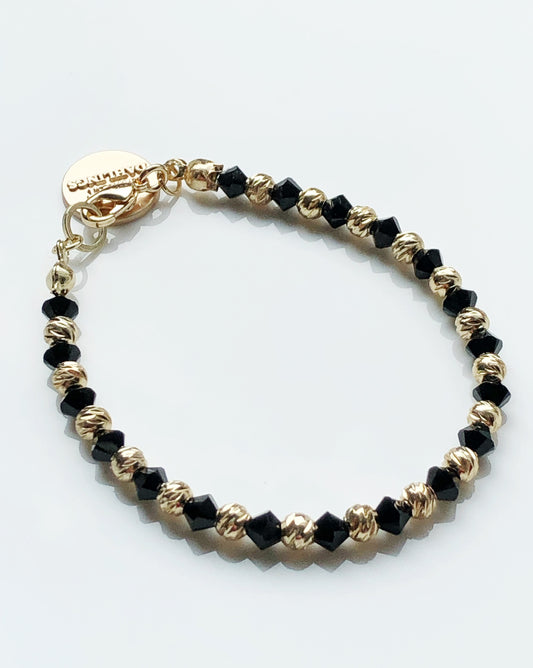 Swarovski crystal and 14K gold plated beads bracelet in black and gold