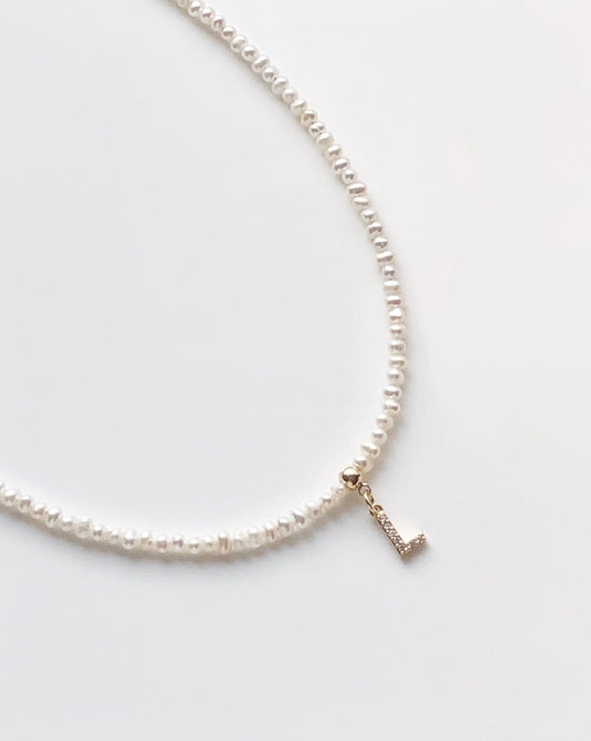 Freshwater seed pearls necklace with initial charm