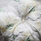 White and Yellow Embroidered Flowers on Lace Pillow