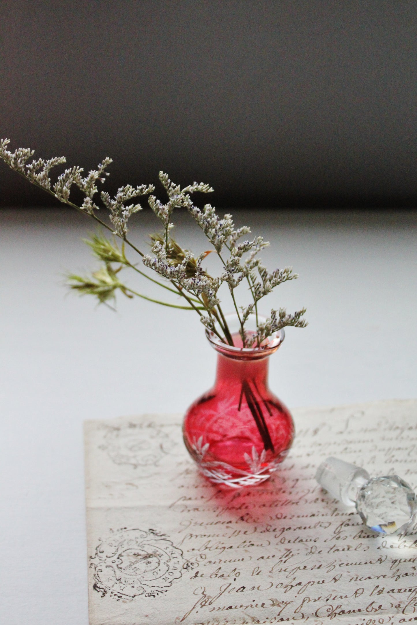 Antique glass perfume apothecary jar in red