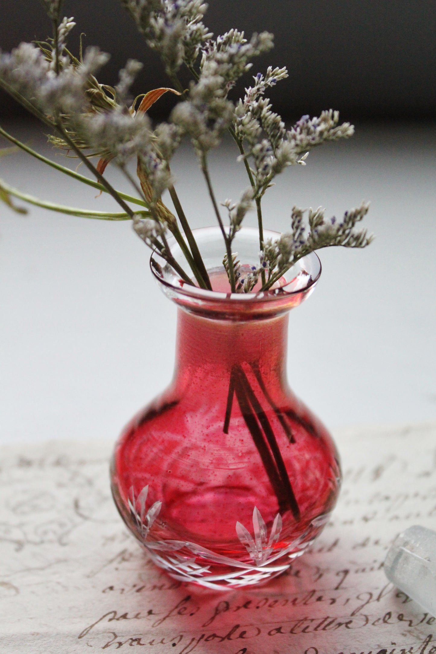 Antique glass perfume apothecary jar in red