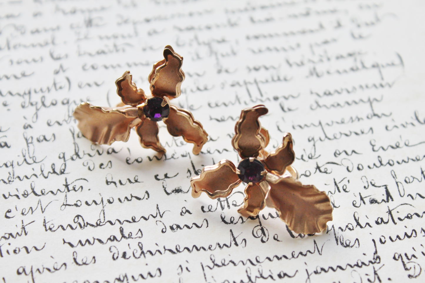 Vintage rose gold orchid earrings with amethyst crystals setting