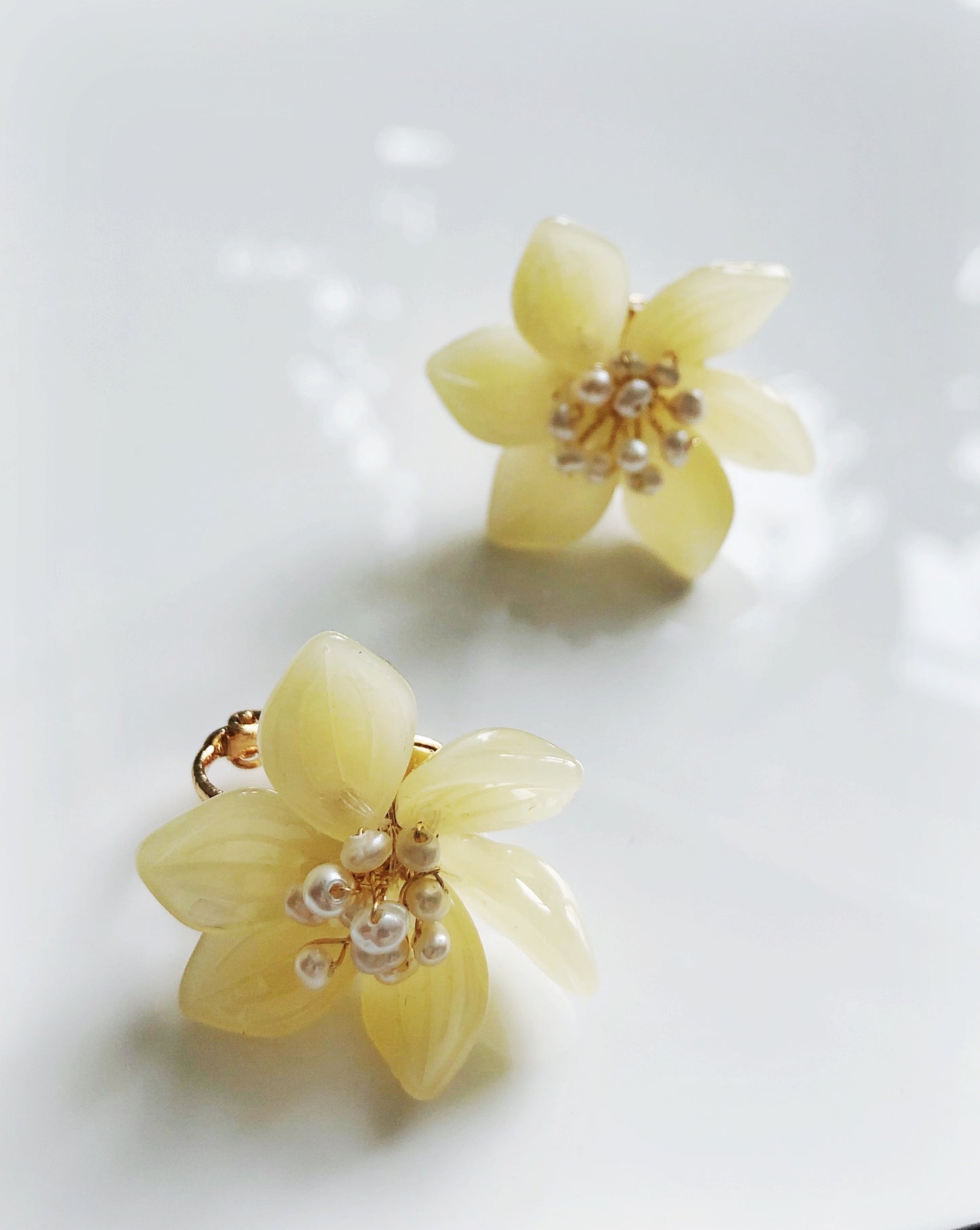 Pastel yellow baby lotus glass and freshwater pearls earrings