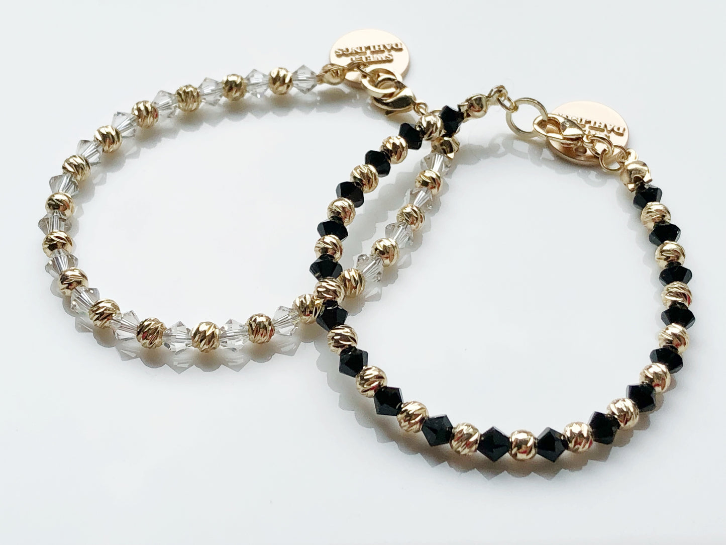 Swarovski crystals and 14K gold plated beads bracelet in white and gold
