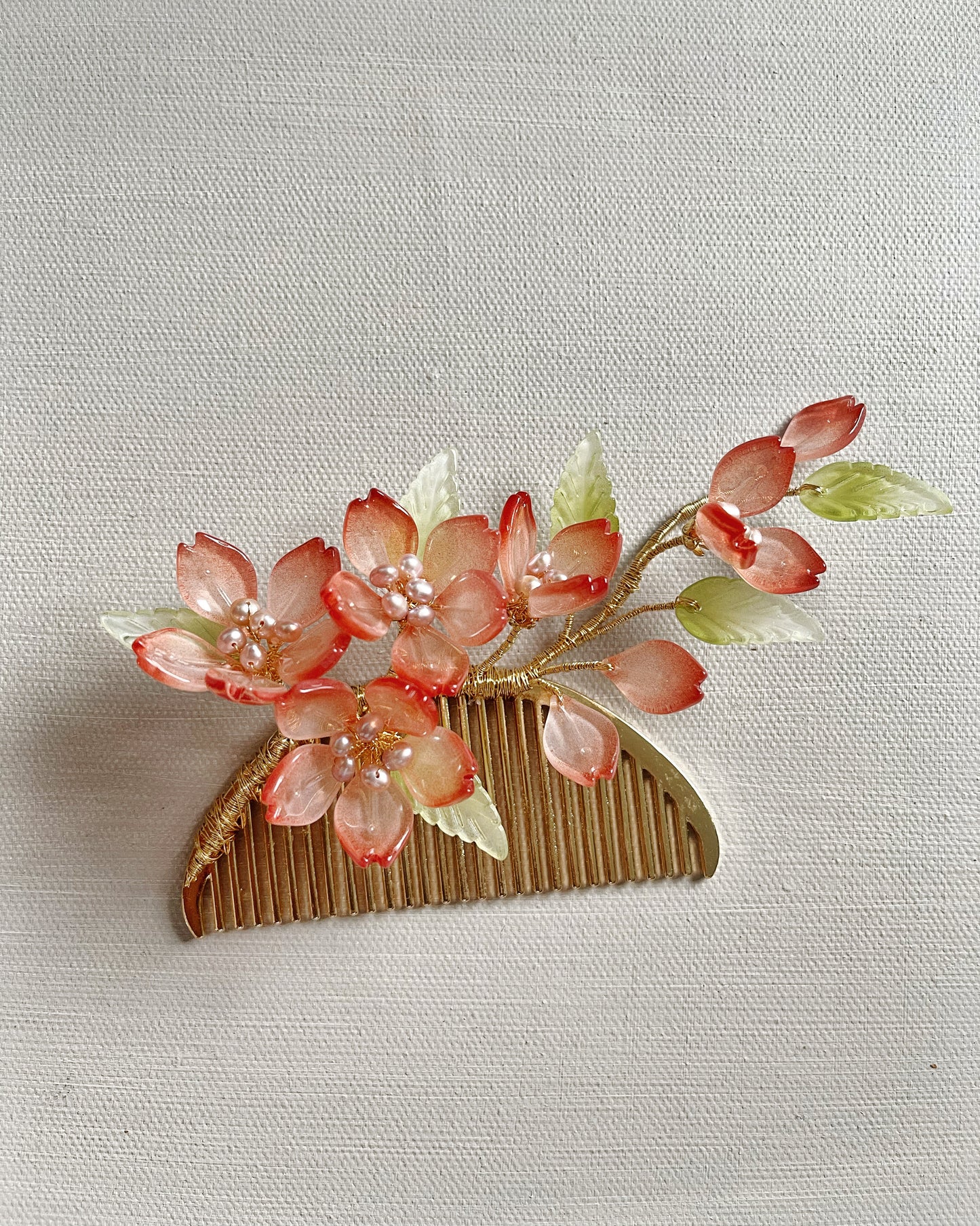 Someiyoshino sakura blooming foliage hairslide in blushing red