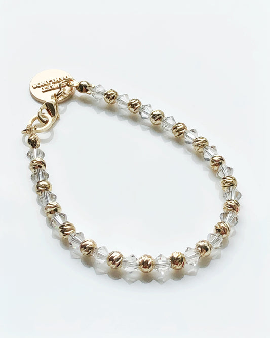 Swarovski crystals and 14K gold plated beads bracelet in white and gold
