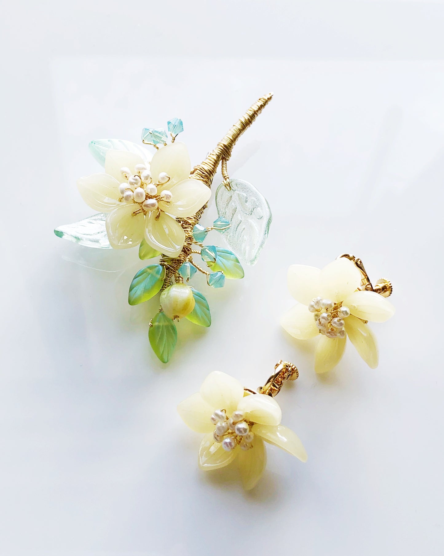 Pastel yellow baby lotus glass and freshwater pearls earrings