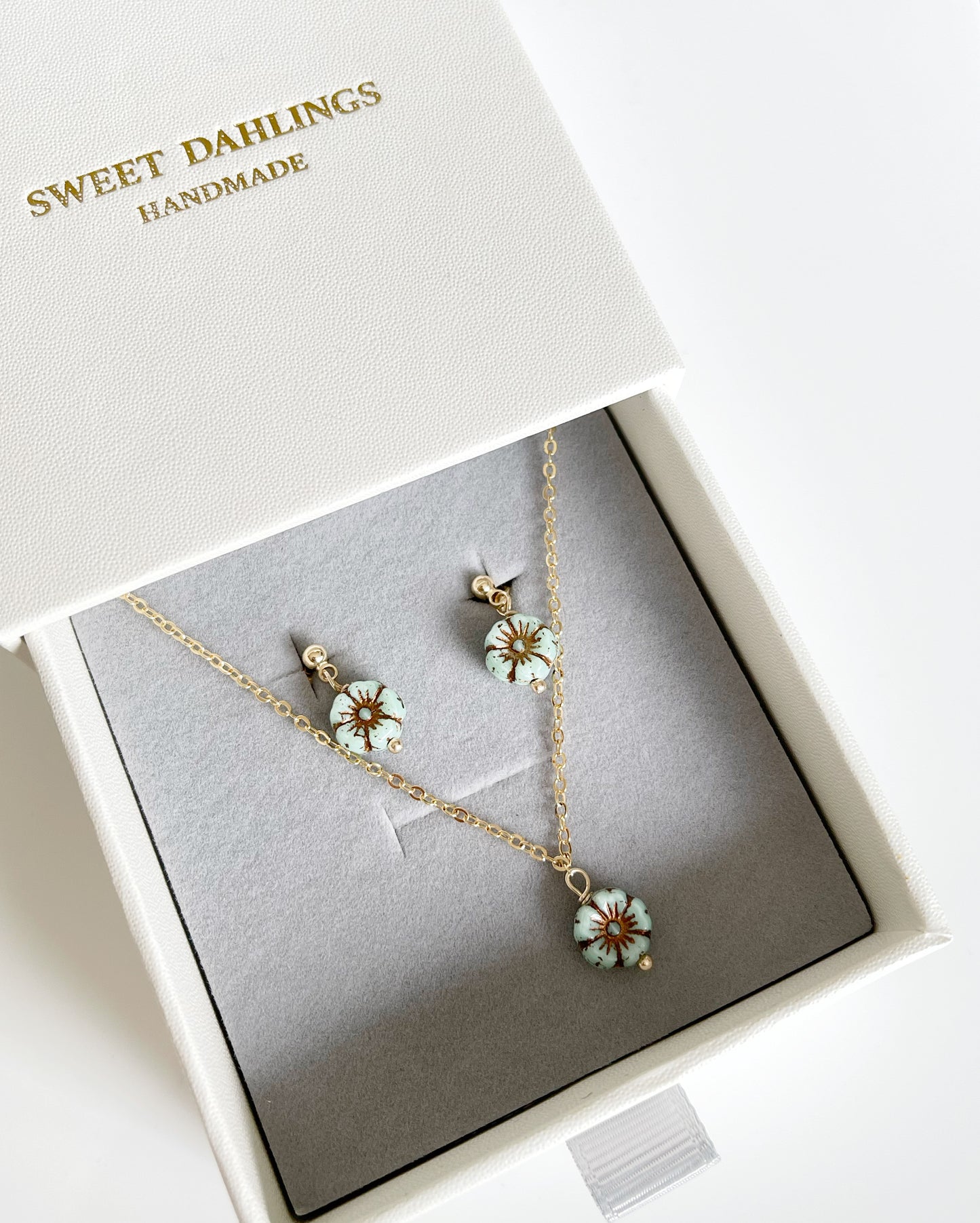 Mini sakura necklace and earrings set in aqua