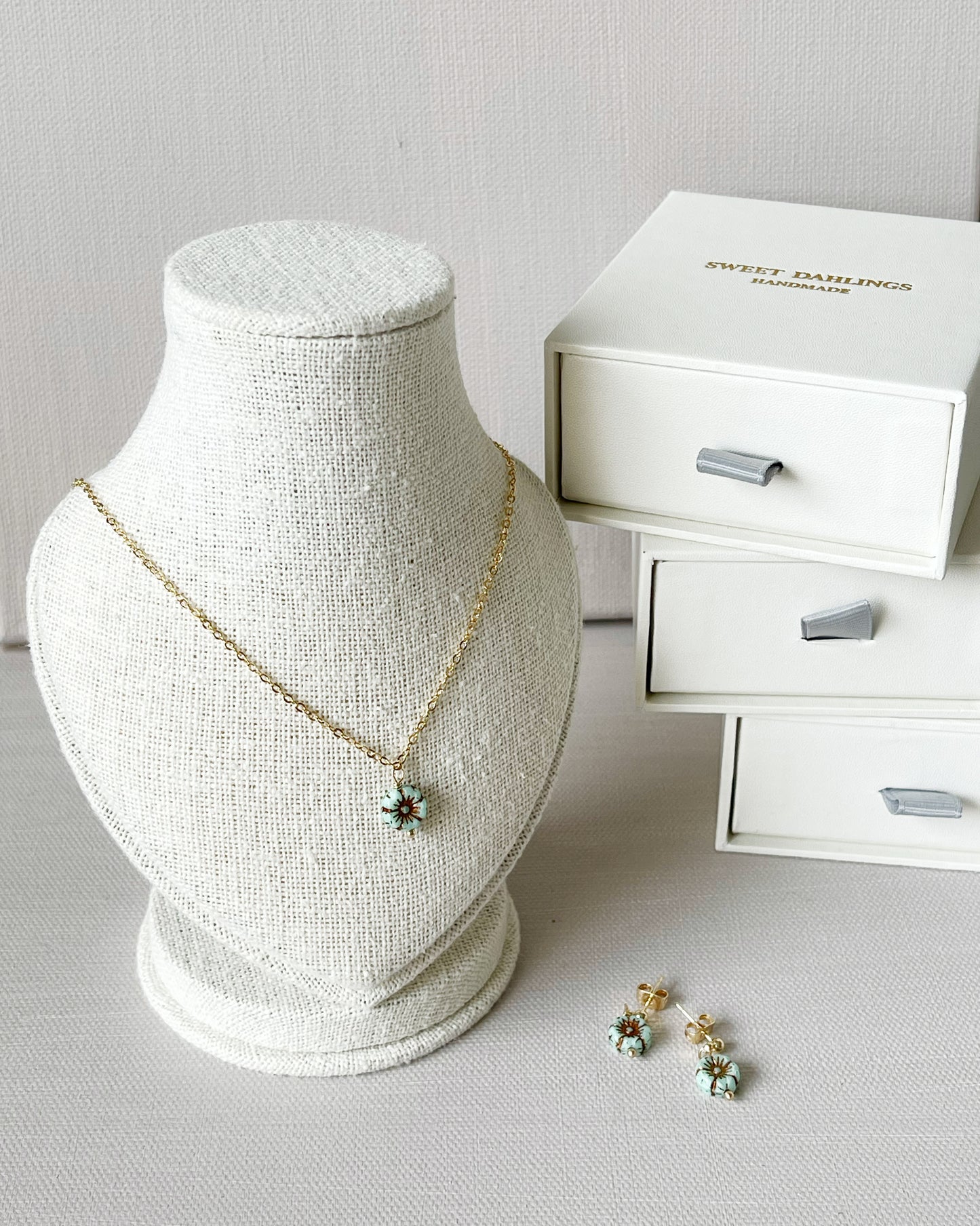 Mini sakura necklace and earrings set in aqua