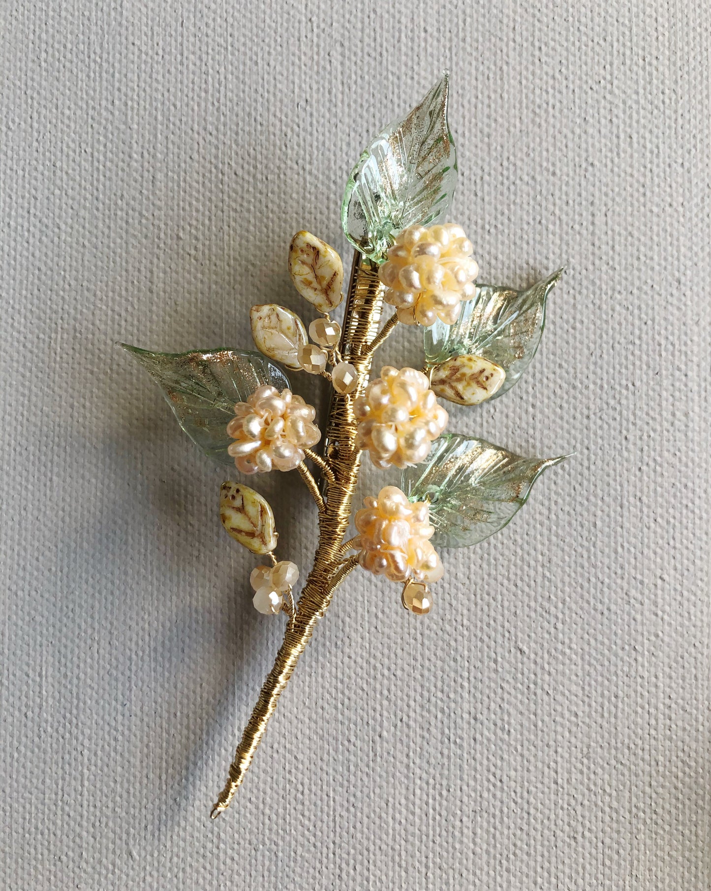 Pearl berries foliage brooch in peach