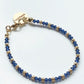 Swarovski crystals and 14K gold plated beads bracelet in blue and gold