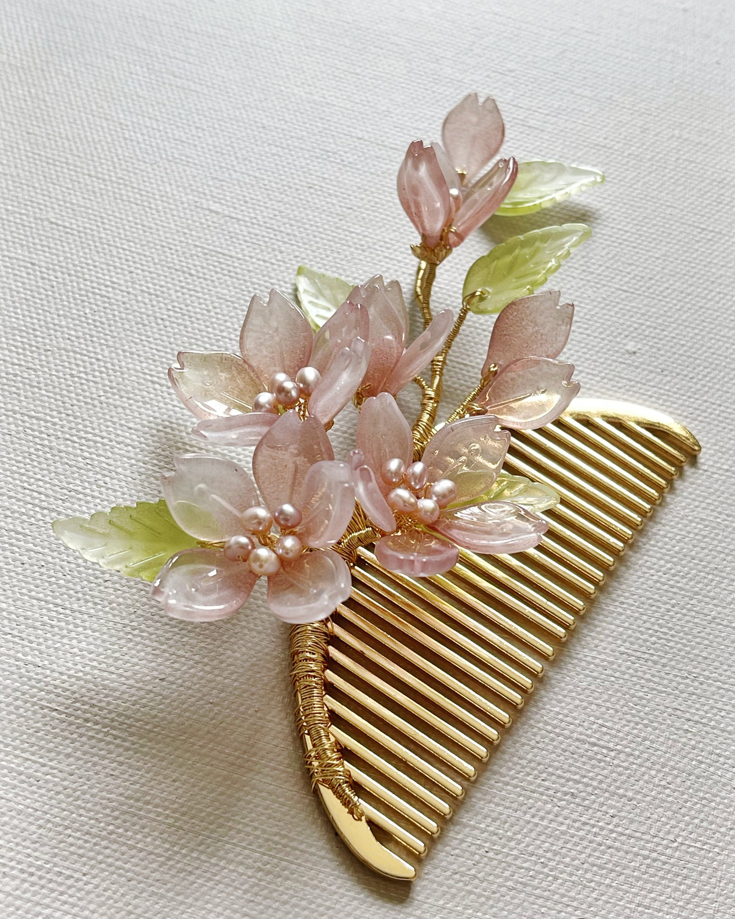 Someiyoshino sakura blooming foliage hairslide in antique pink
