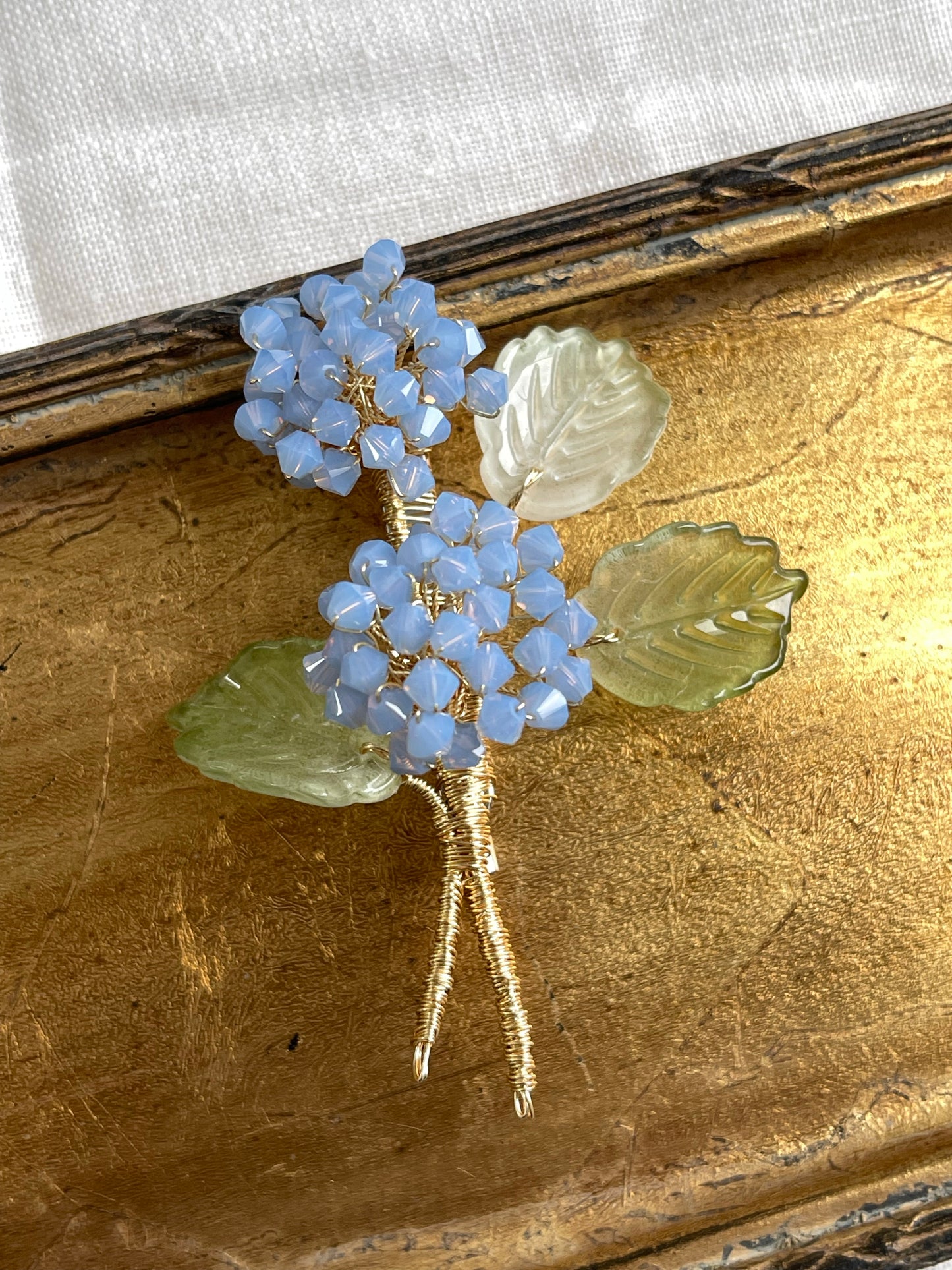 Spring hydrangea brooch in sky blue crystals