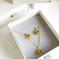 Mini sakura necklace and earrings set in avocado