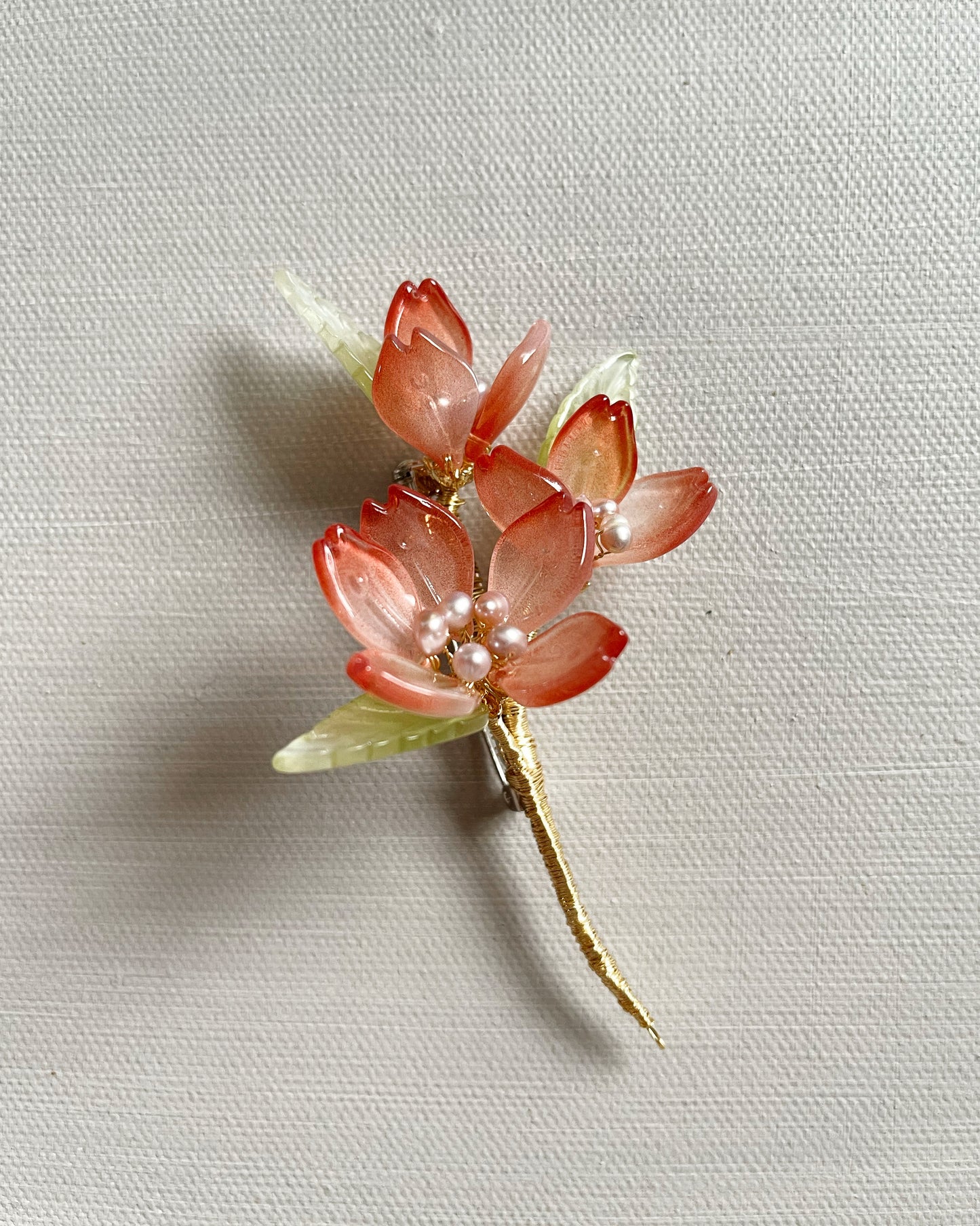 Someiyoshino sakura half opening bouquet brooch in blushing red
